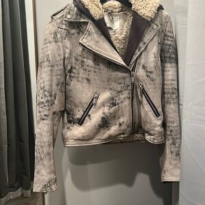 Doma leather jacket with faux fur lining.